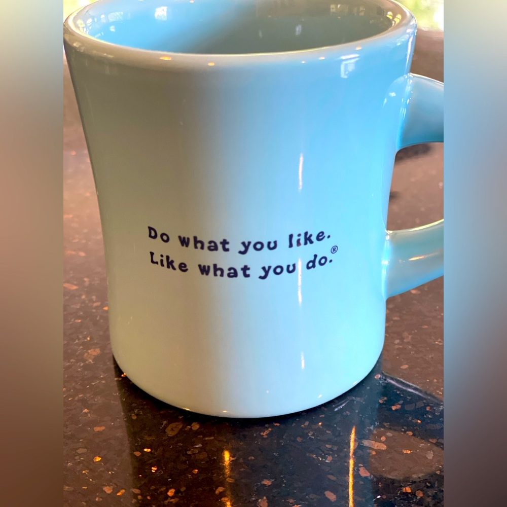 Life Is Good Light Blue Mug with Pink and Yellow Flower Center.  Like new.
